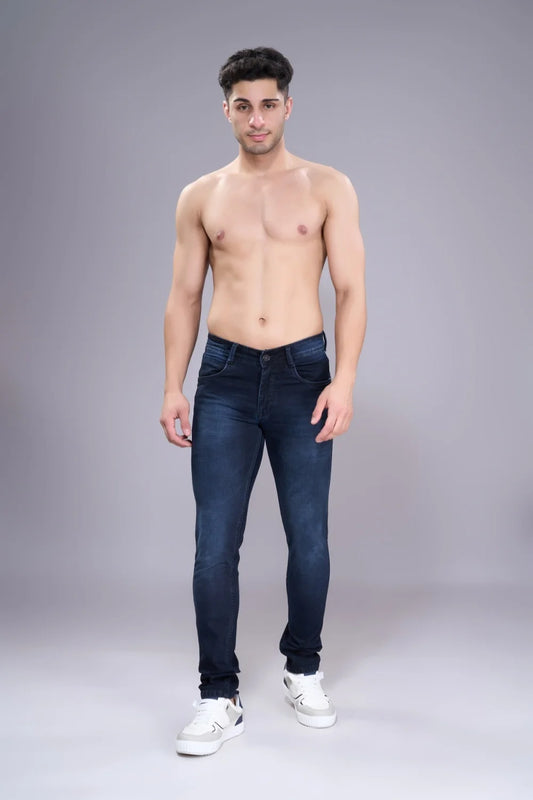 Lifestyle image of men’s classic blue regular fit jeans styled for casual everyday outfits.