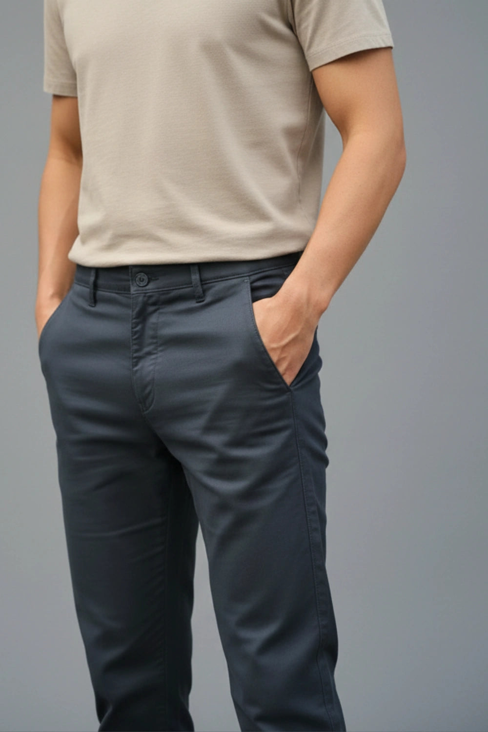 View of the side of pant pockets on dark blue trousers