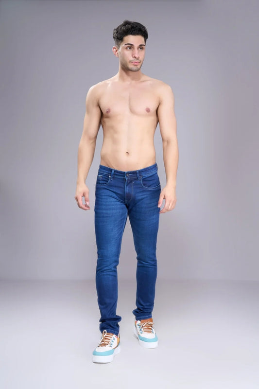 Full body standing pose showcasing men’s regular fit denim jeans in blue