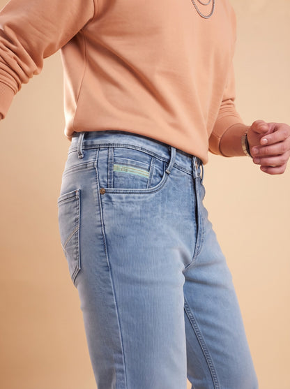 Light blue slim fit jeans side pocket close-up