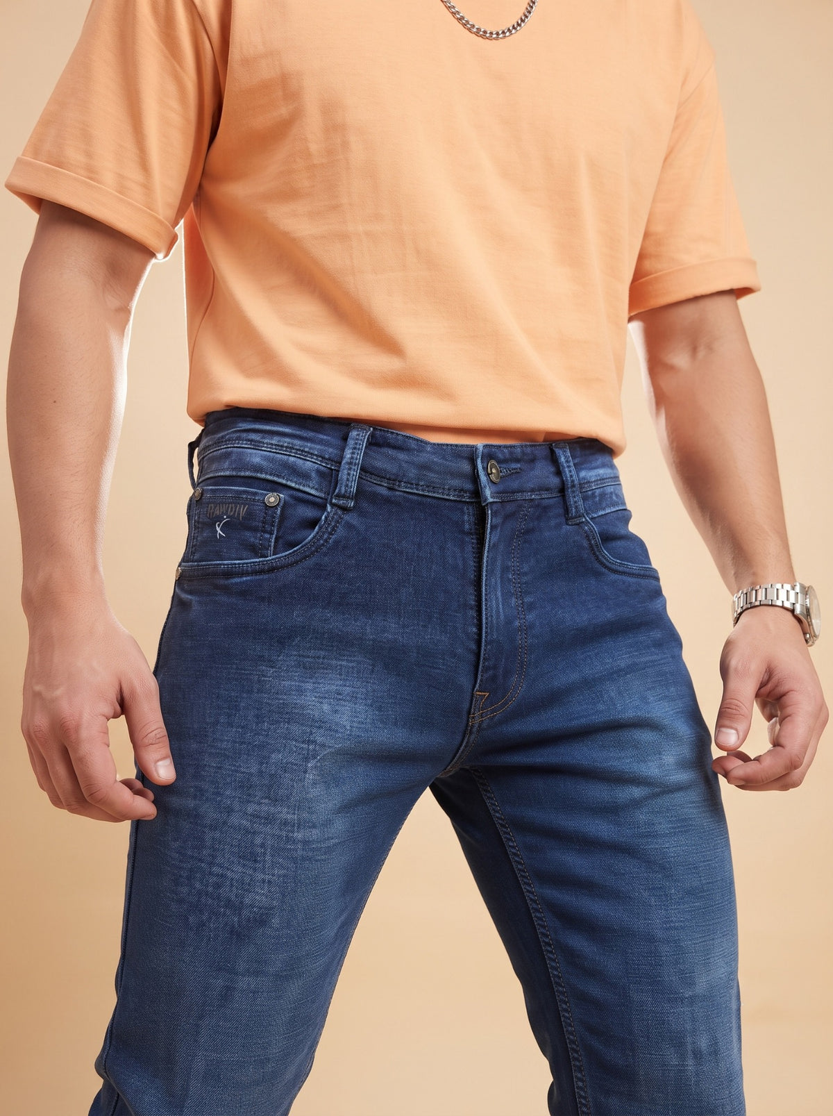 Dark indigo jeans front waistband and pocket detail