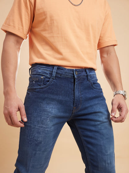 Dark indigo jeans front waistband and pocket detail