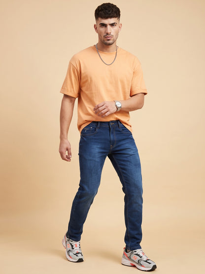 Men's dark indigo slim fit stretch jeans front view