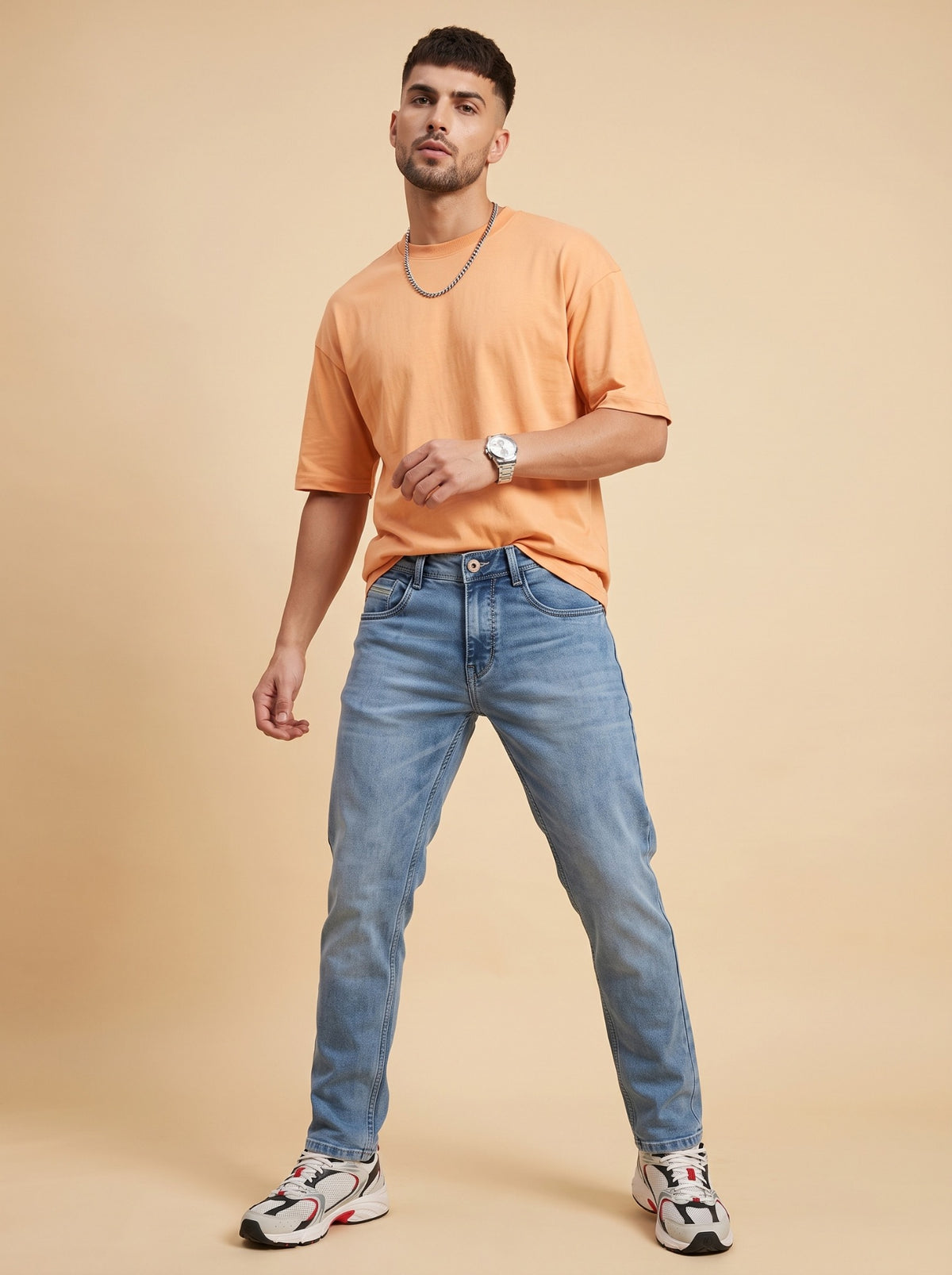 Men's mid-blue washed slim fit stretch jeans front view