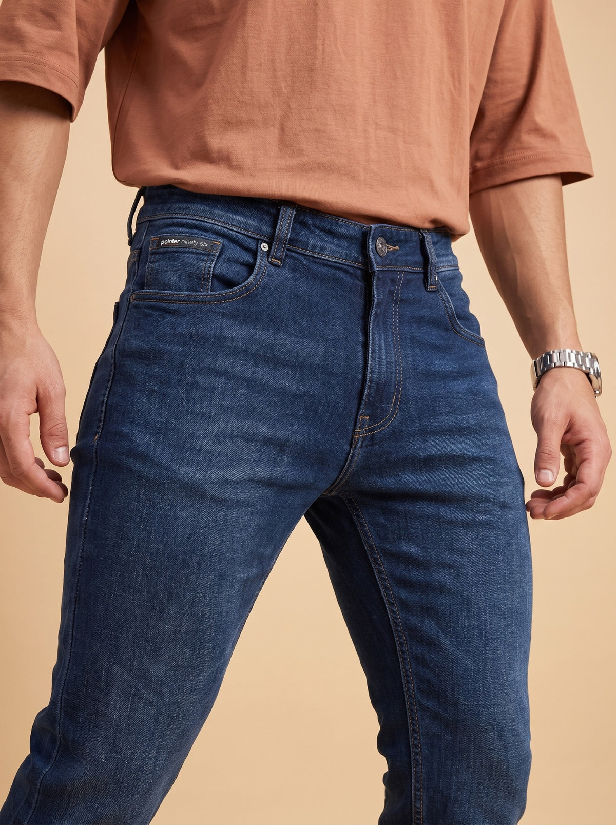 Deep blue jeans waistband and front pocket detail