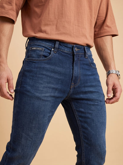 Deep blue jeans waistband and front pocket detail
