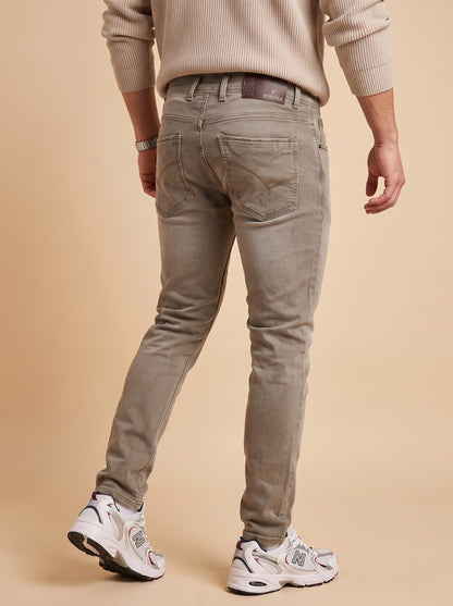 Men's taupe grey slim fit jeans back angle