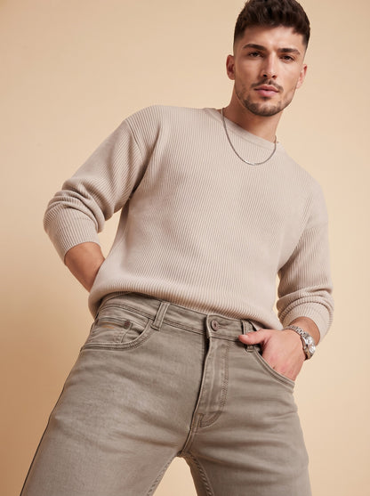 Men's taupe slim fit jeans lifestyle view