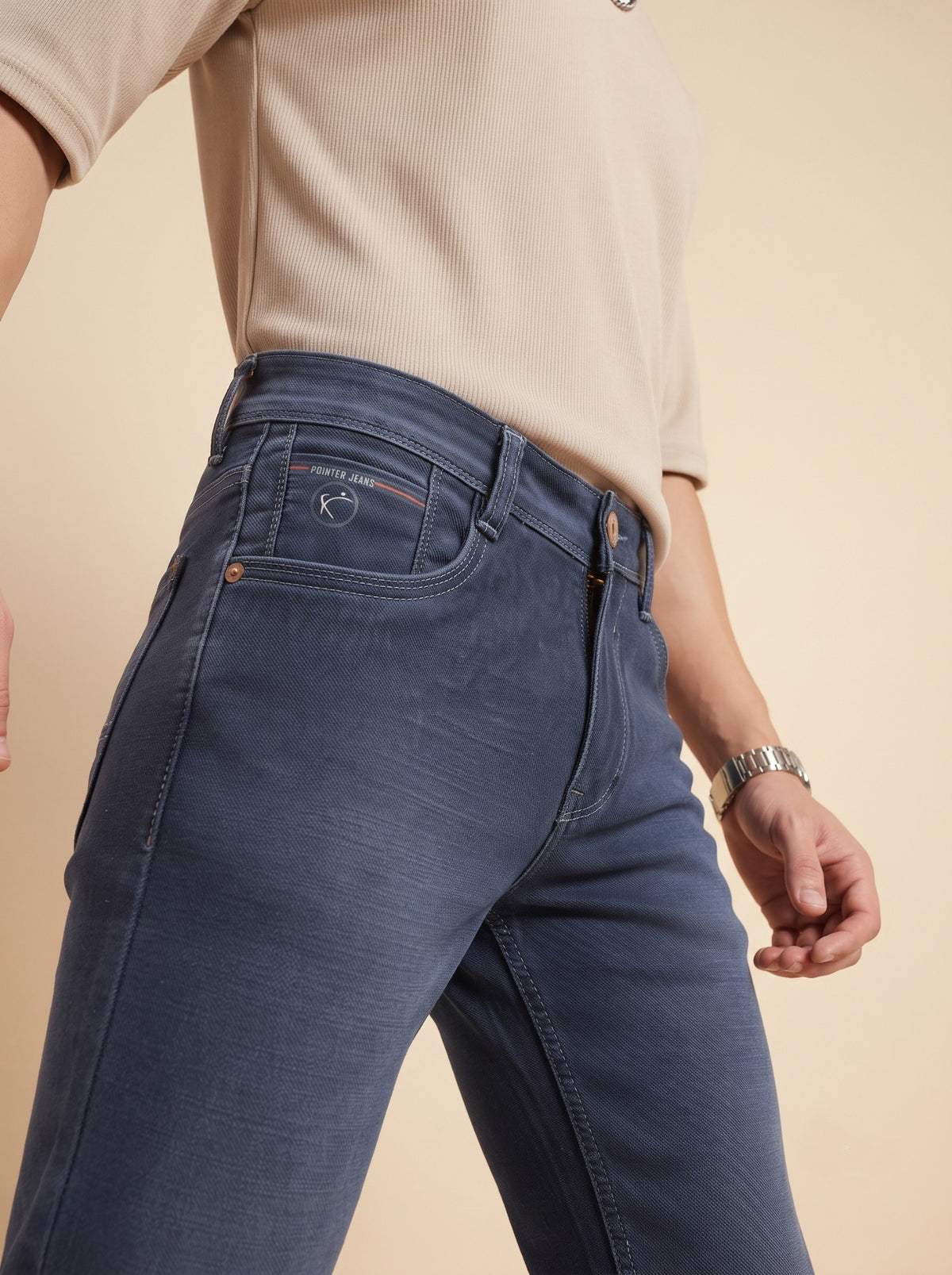 Steel blue jeans side pocket detail