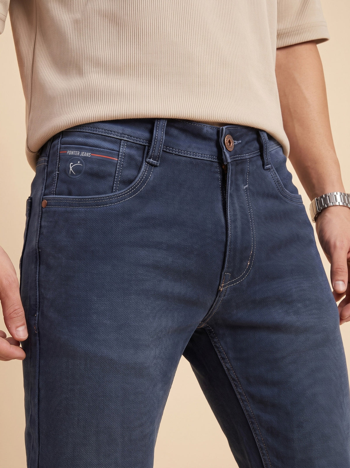 Steel blue jeans waistband and pocket detail