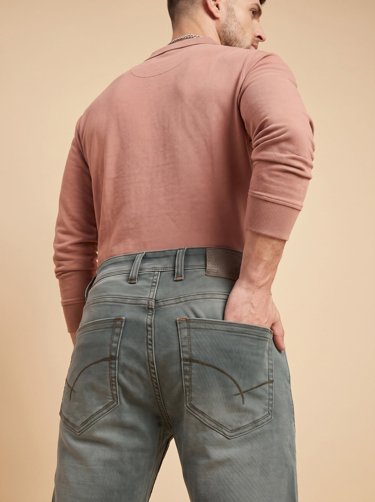 Sage grey jeans rear pocket and waistband detail