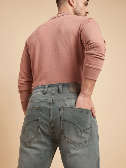 Sage grey jeans rear pocket and waistband detail