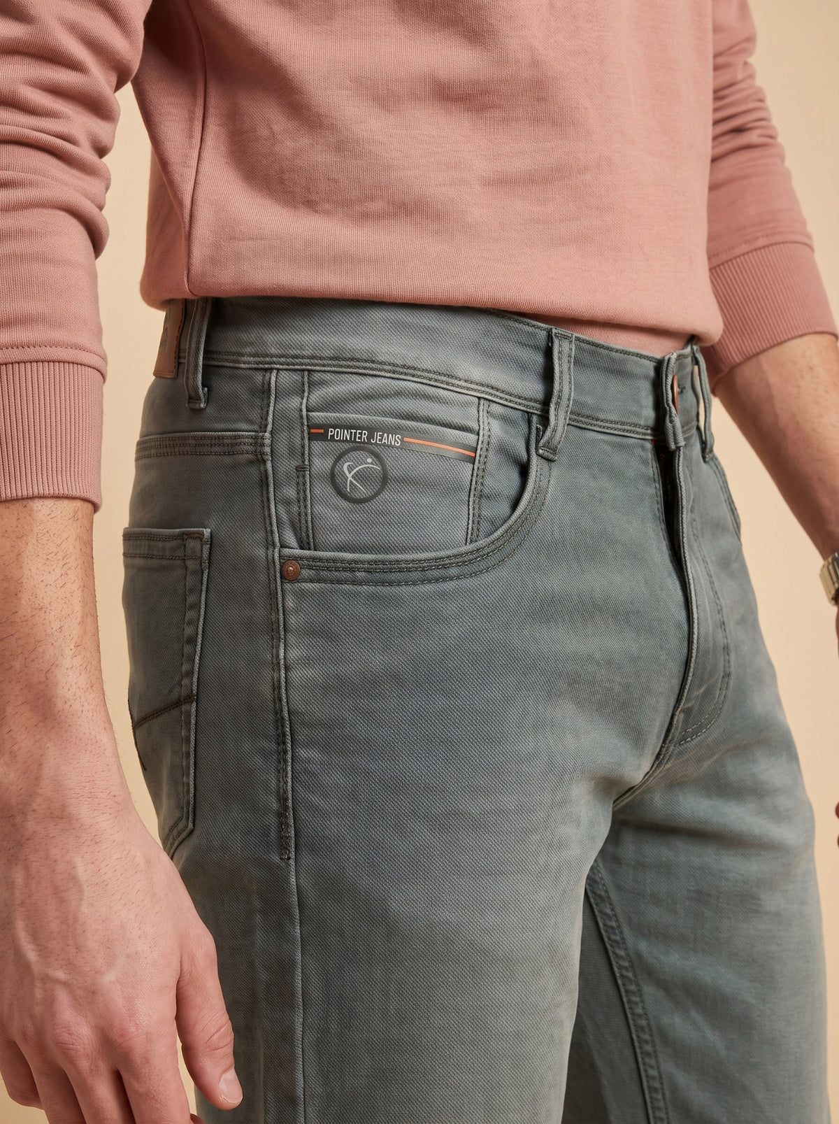 Sage grey jeans front pocket close-up