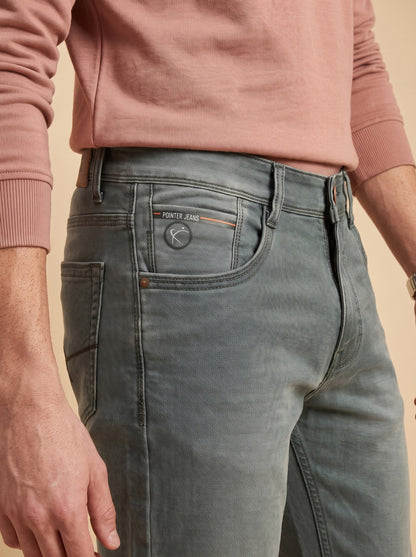Sage grey jeans front pocket close-up