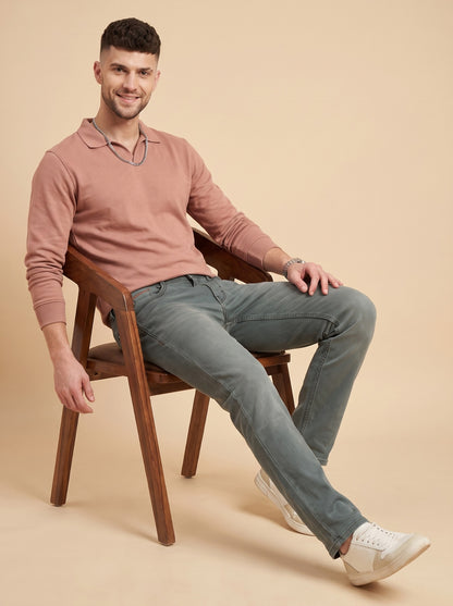 Men's sage grey jeans seated front view