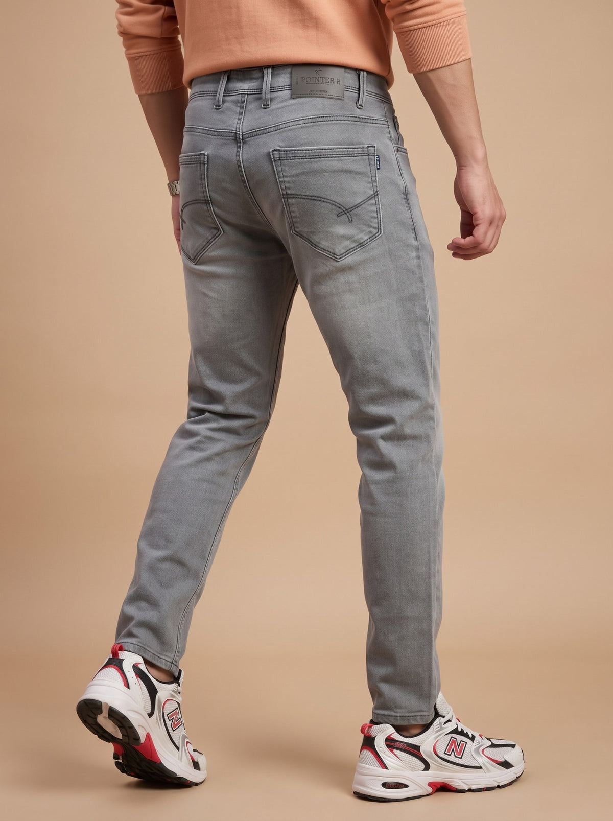 Men's light grey slim fit jeans back angle