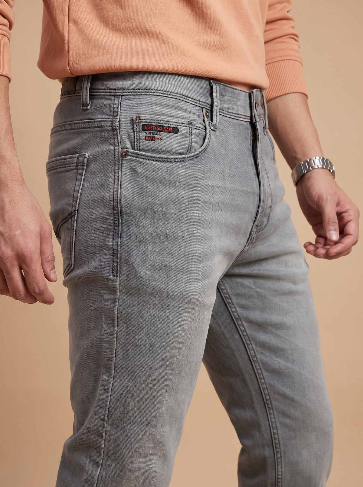 Light grey jeans pocket and wash detail