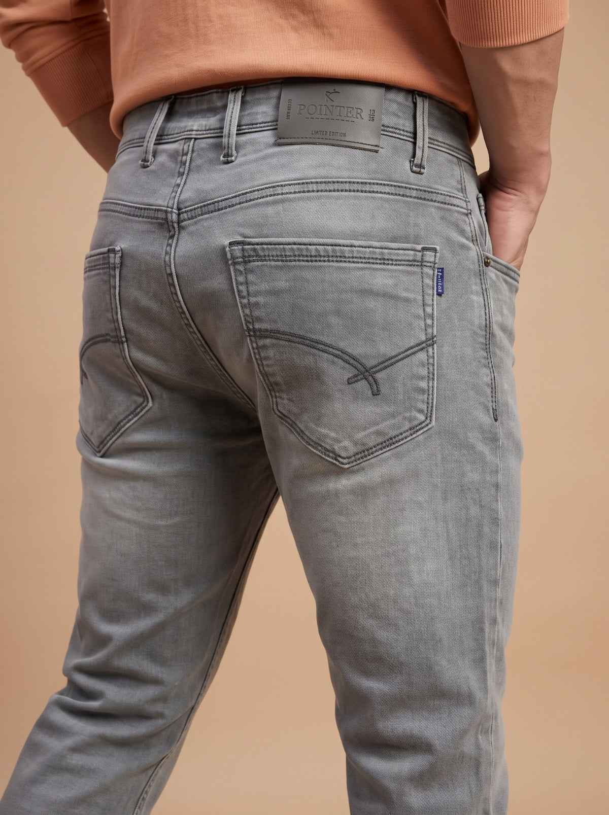 Light grey slim fit jeans rear detail
