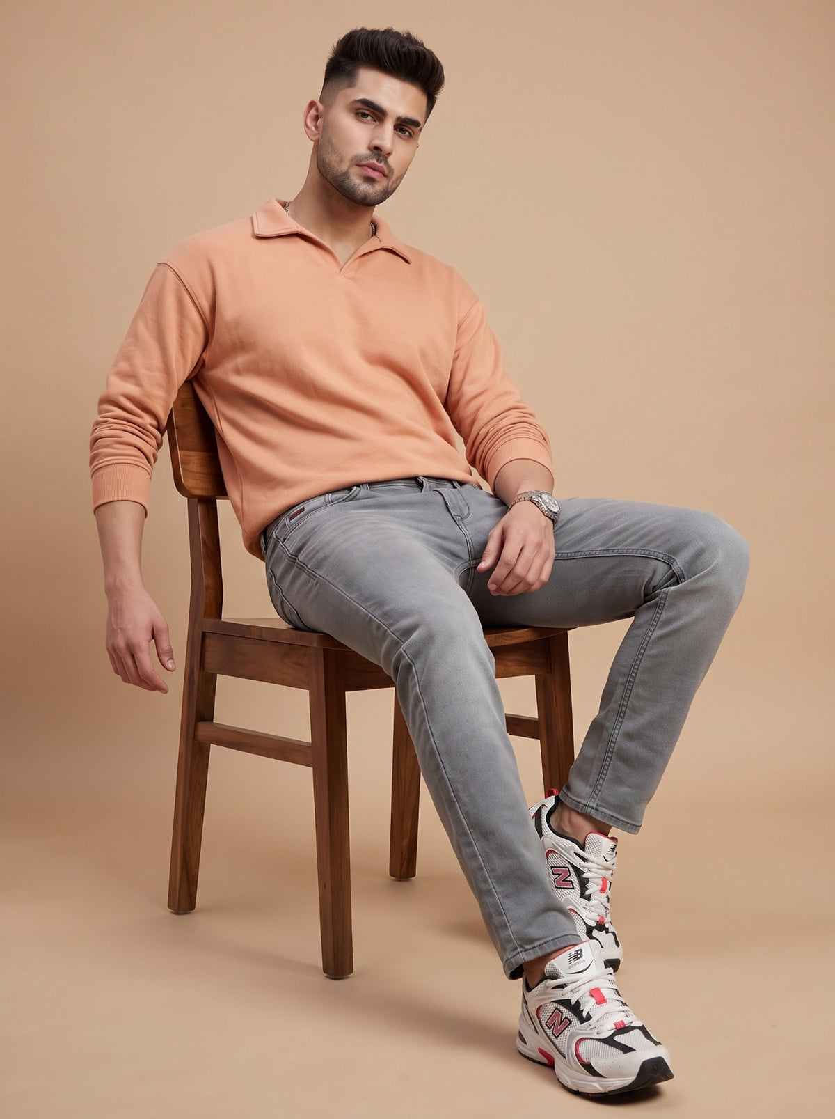 Men's light grey stretch jeans seated view