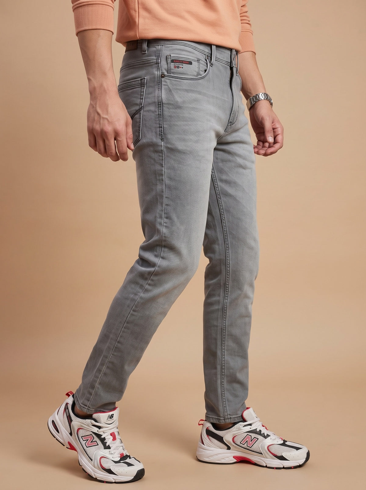 Men's light grey slim fit jeans side view