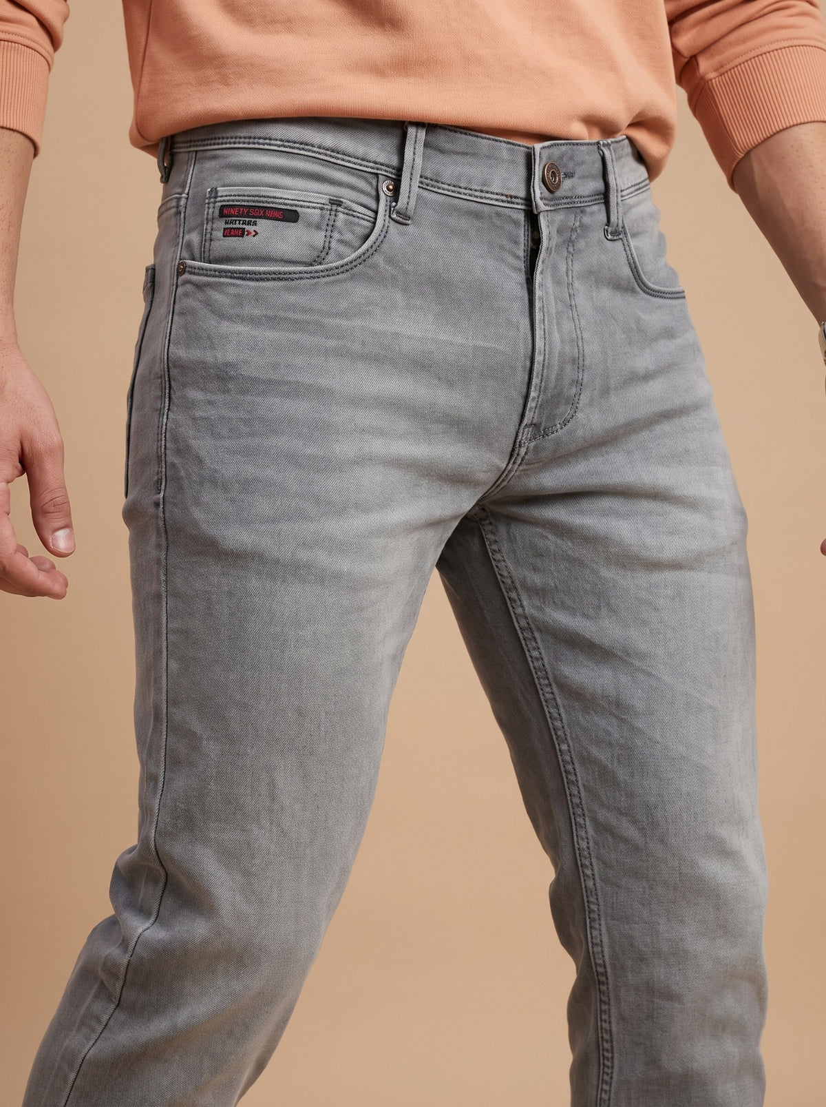 Light grey jeans waistband and front detail