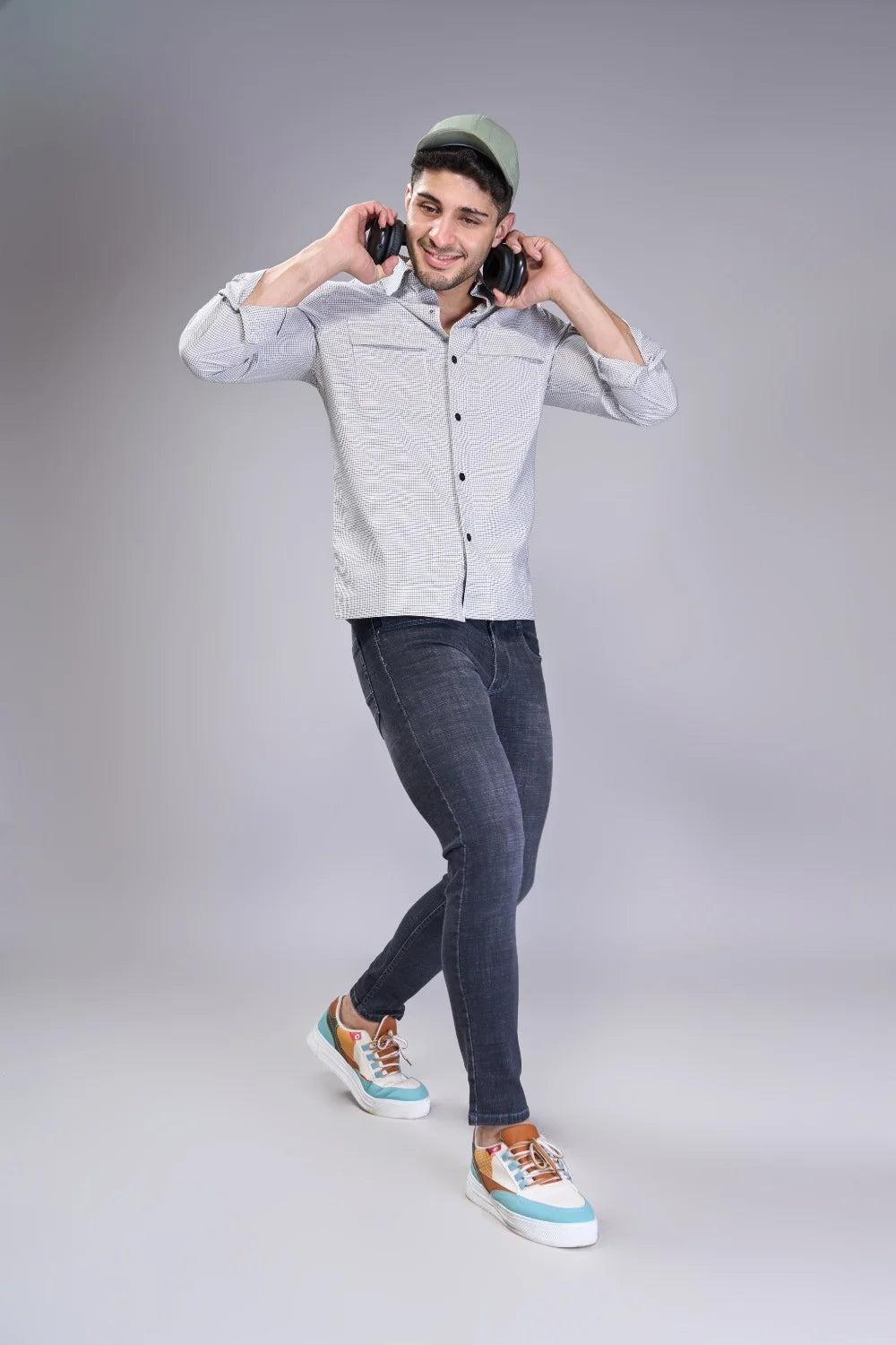 Evening outfit pairing showing ankle-focused jean silhouette
