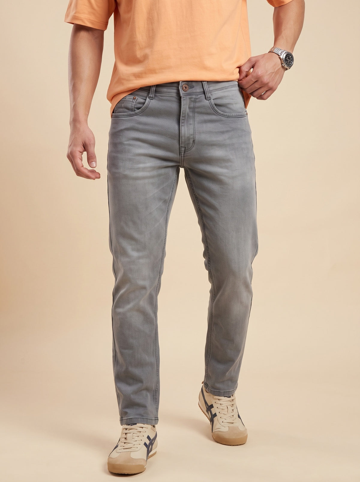 Men's ash grey straight fit jeans, front walking view