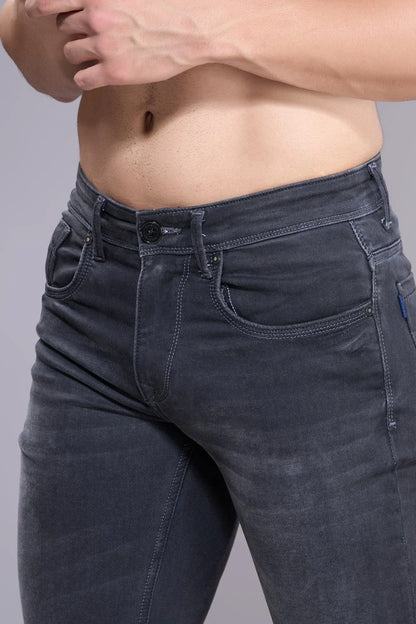 Side profile of men’s black regular fit jeans in premium stretch denim
