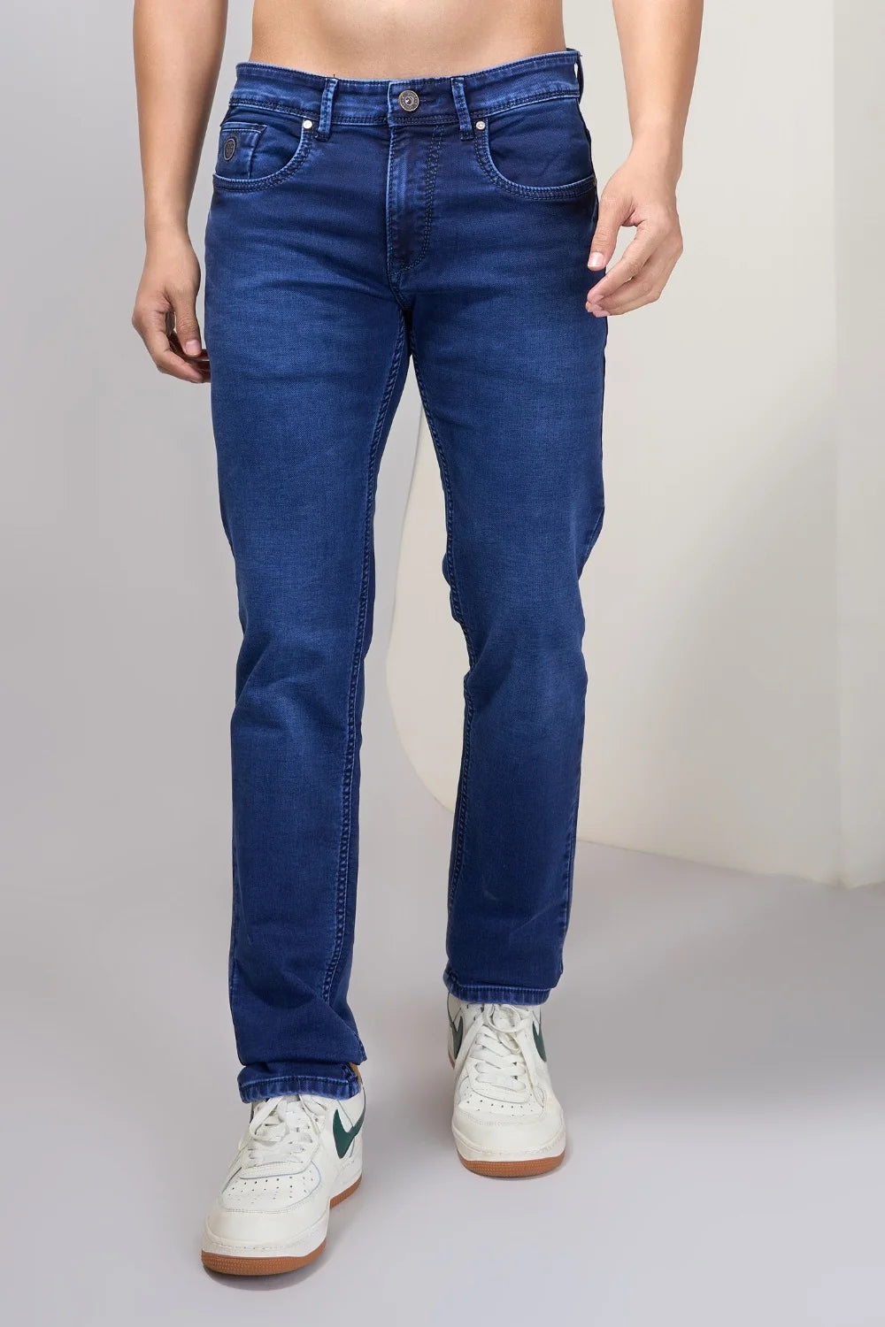 Comfort-driven blue denim styled for daily men’s wear
