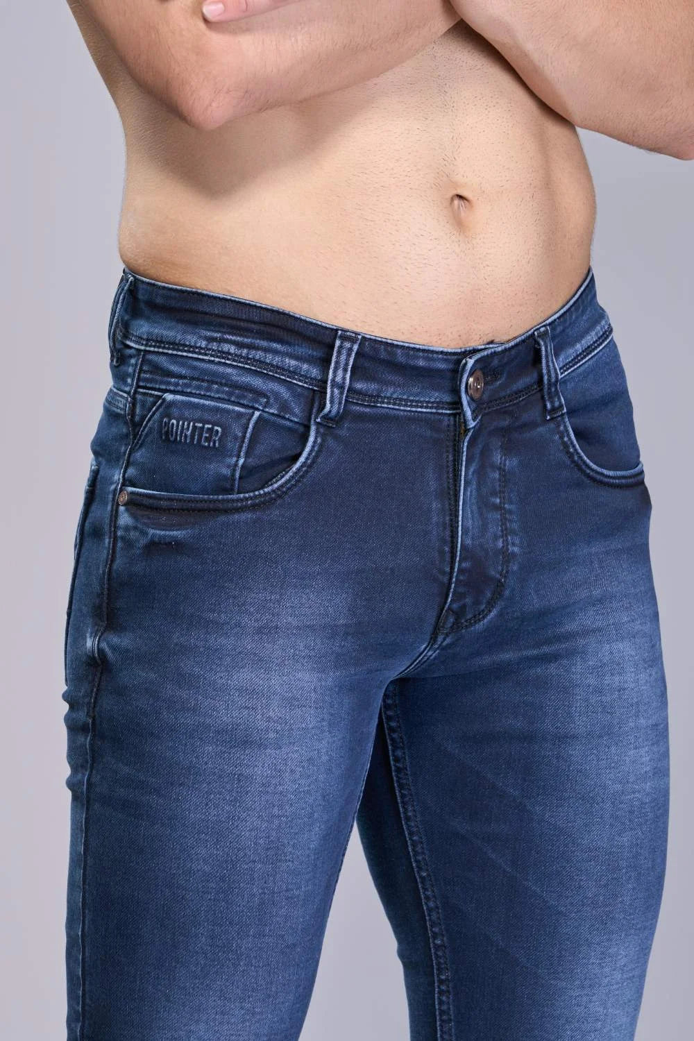 Close-up of Oxford Blue ankle jeans fabric and stitching for boys
