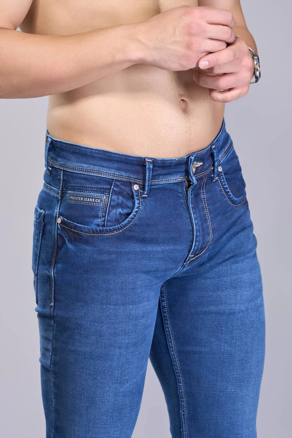 Men’s regular fit classic blue denim jeans side pose
