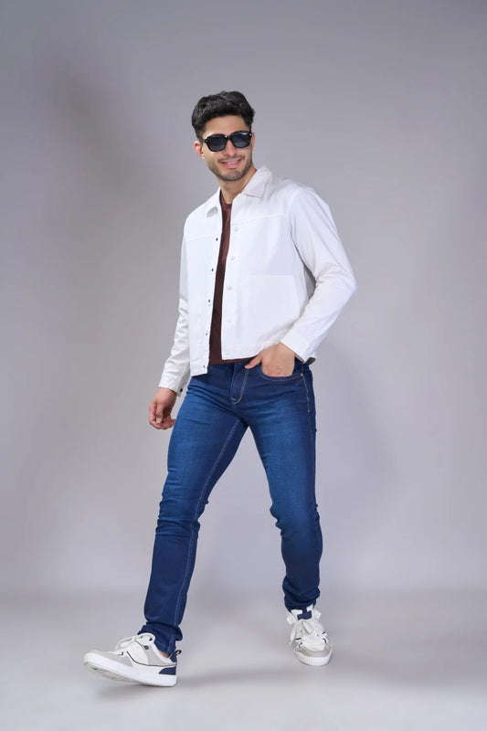 Front look of men's classic blue jeans paired with a white shirt
