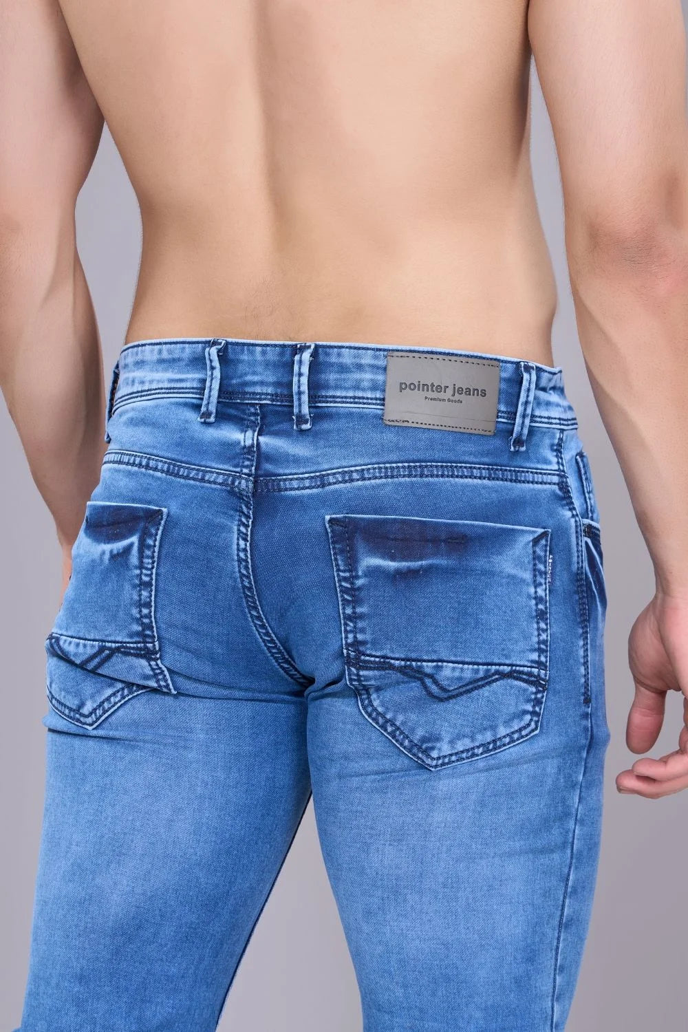 Back view of men’s regular fit jeans in a modern ice blue shade