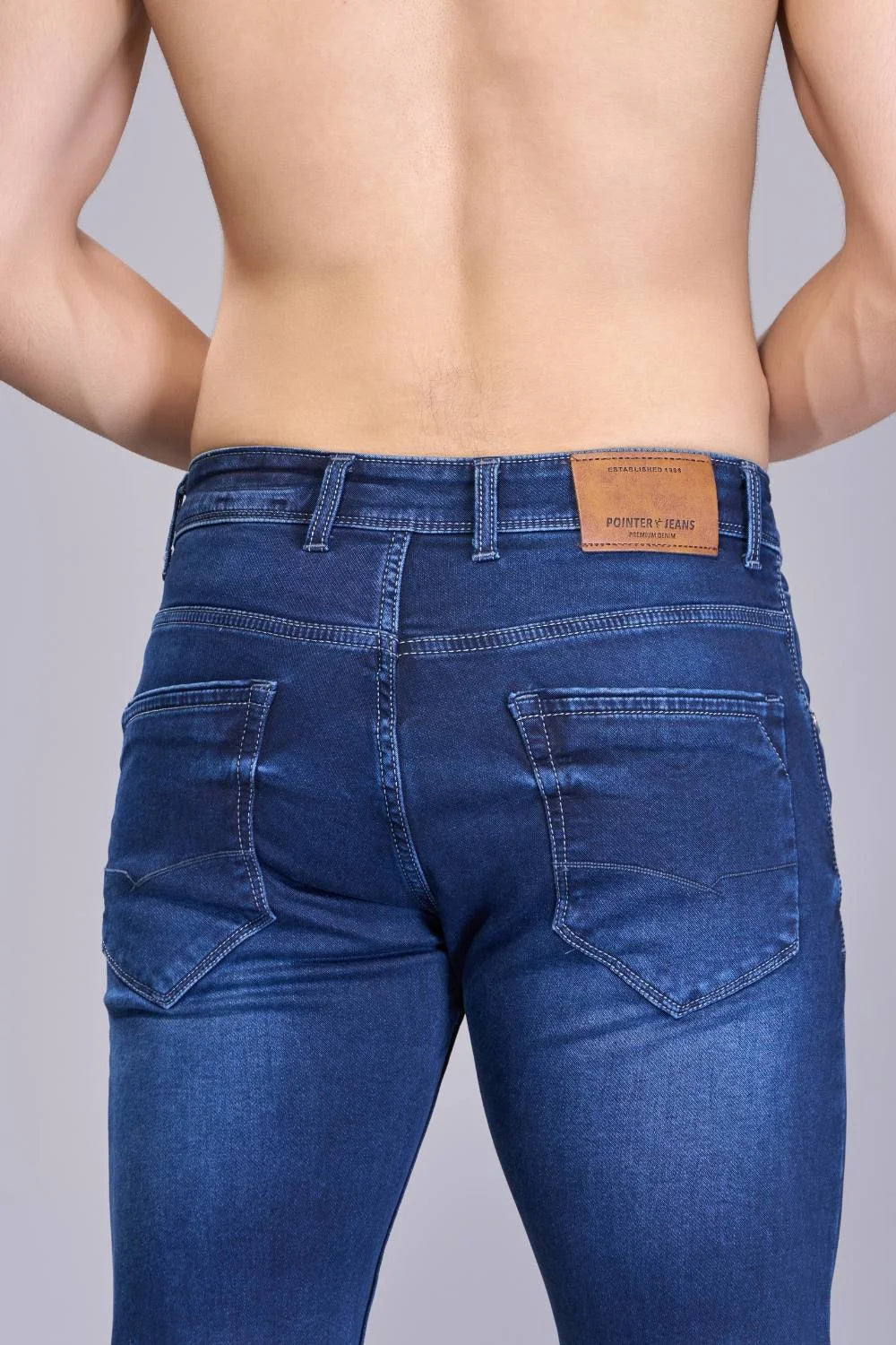 Back view of Dark Blue ankle length jeans for men
