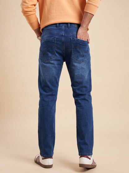 Men's deep indigo straight fit jeans, full back view