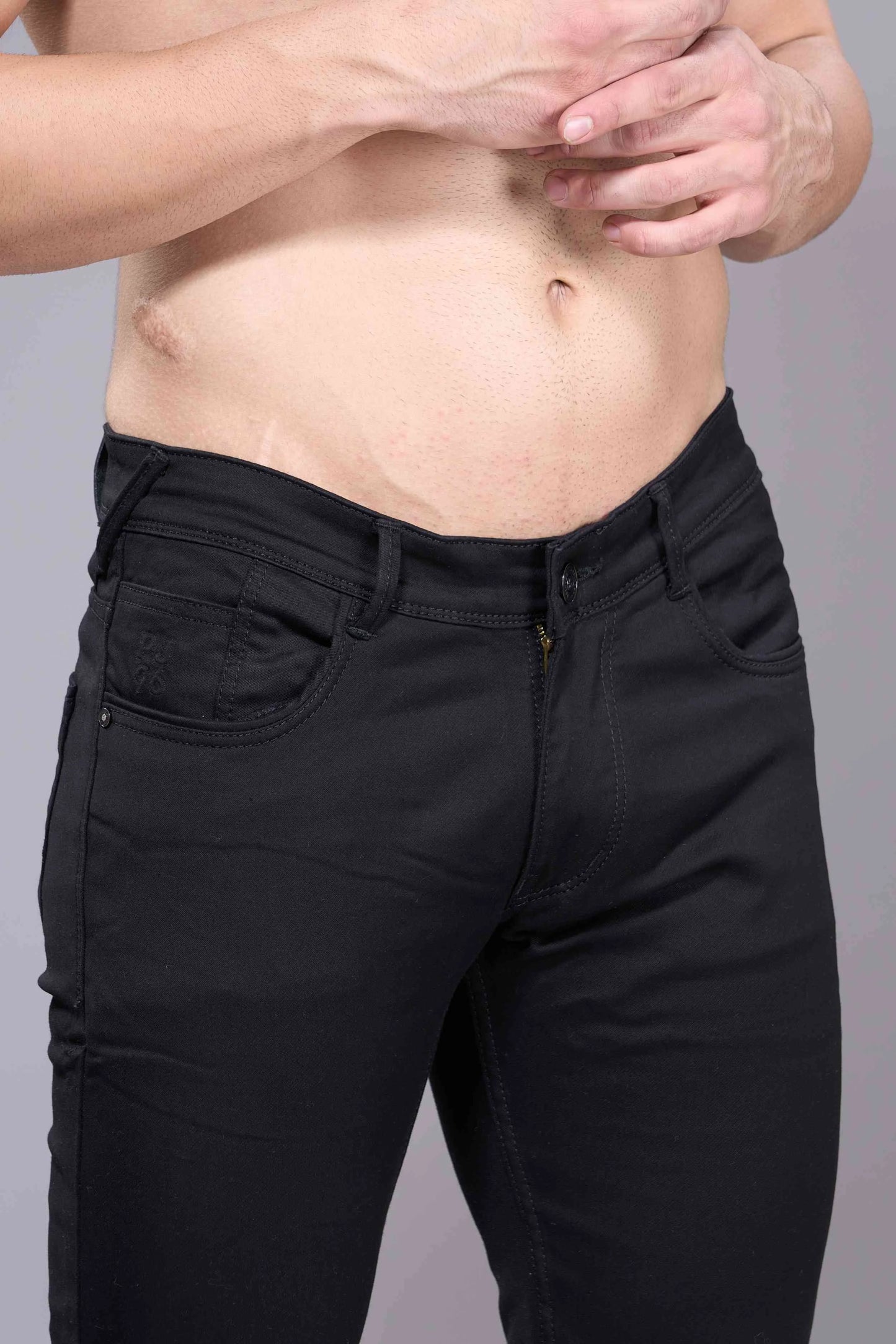 Fabric and stitching details of men’s regular fit denim jeans India