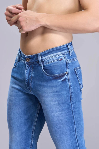 pocket detailing and waistband structure of blue denim
