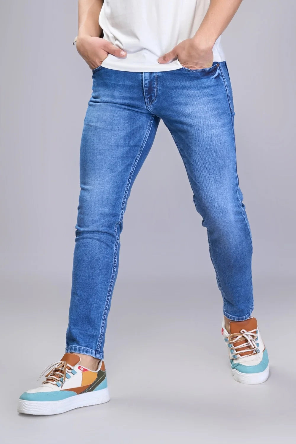 Outfit pairing example with blue tapered jeans
