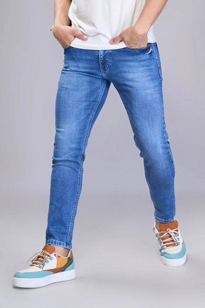 Outfit pairing example with blue tapered jeans
