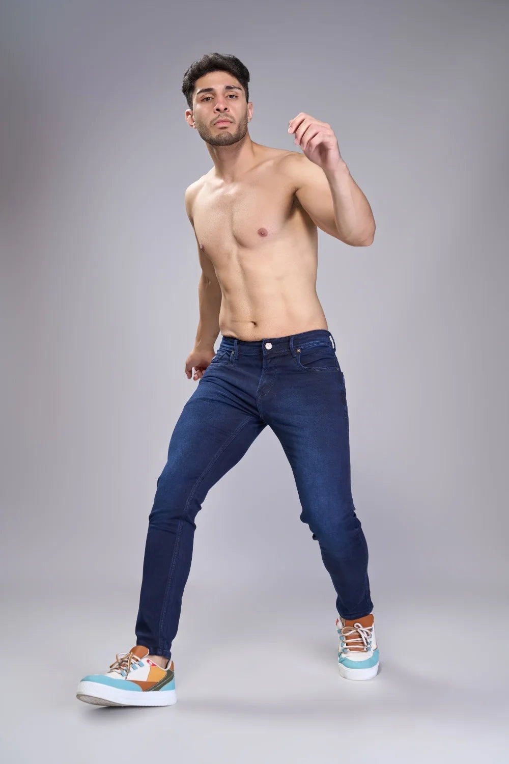 Walking motion showing stretch and recovery of the tapered denim
