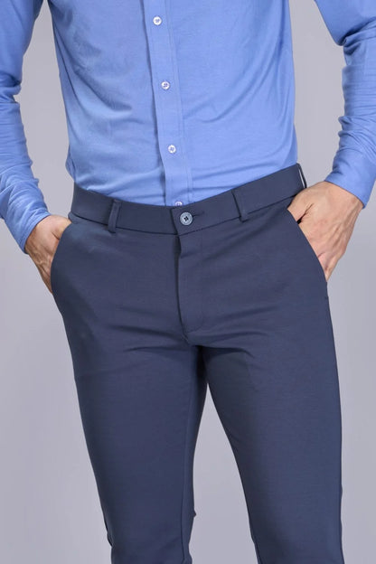Flexible grey pants ideal for commuting, travel and casual wear

