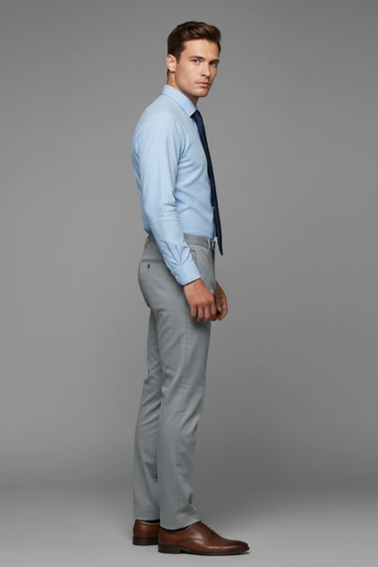 dark grey pants paired with clean light blue shirt