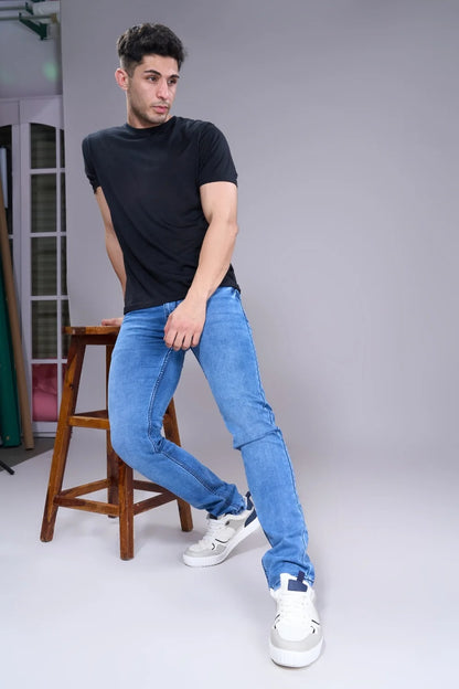 Men’s ice-wash denim in regular fit displayed in an angled pose
