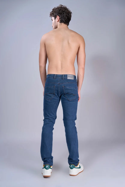Side profile view showing men’s indigo denim fit and texture
