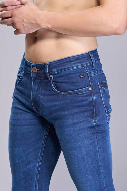 Side profile view of men's blue regular fit denim jeans
