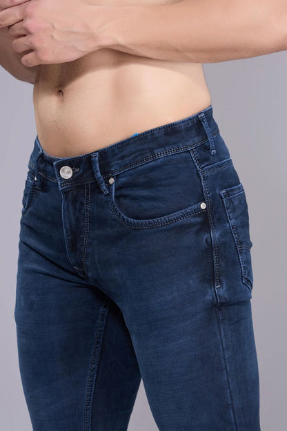 Side view of men’s regular fit straight cut denim jeans
