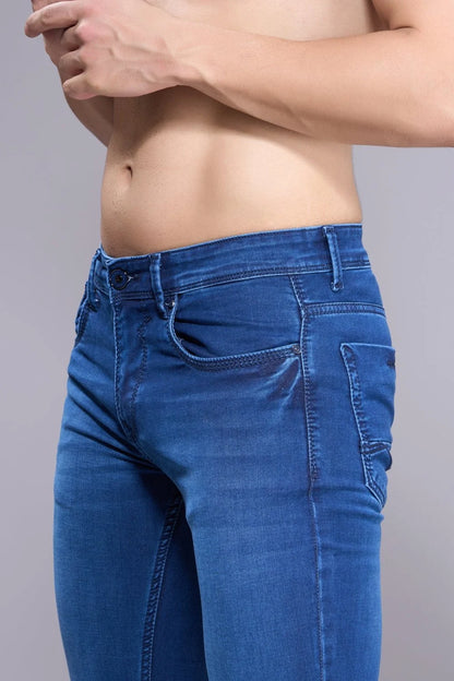 Waistband detail of men’s regular fit stretch jeans with comfortable rise
