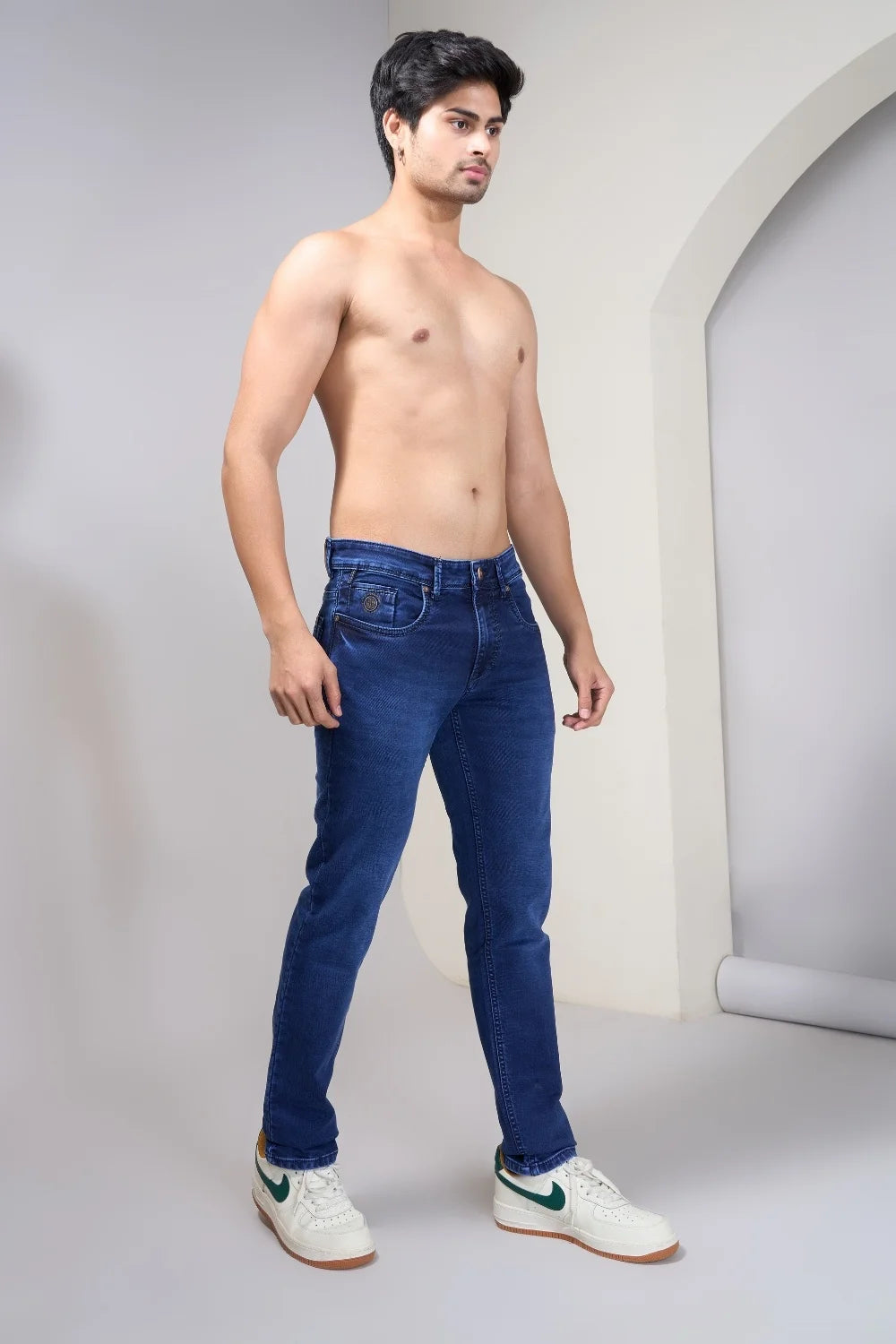 Premium regular fit jeans highlighted in a studio outfit shoot
