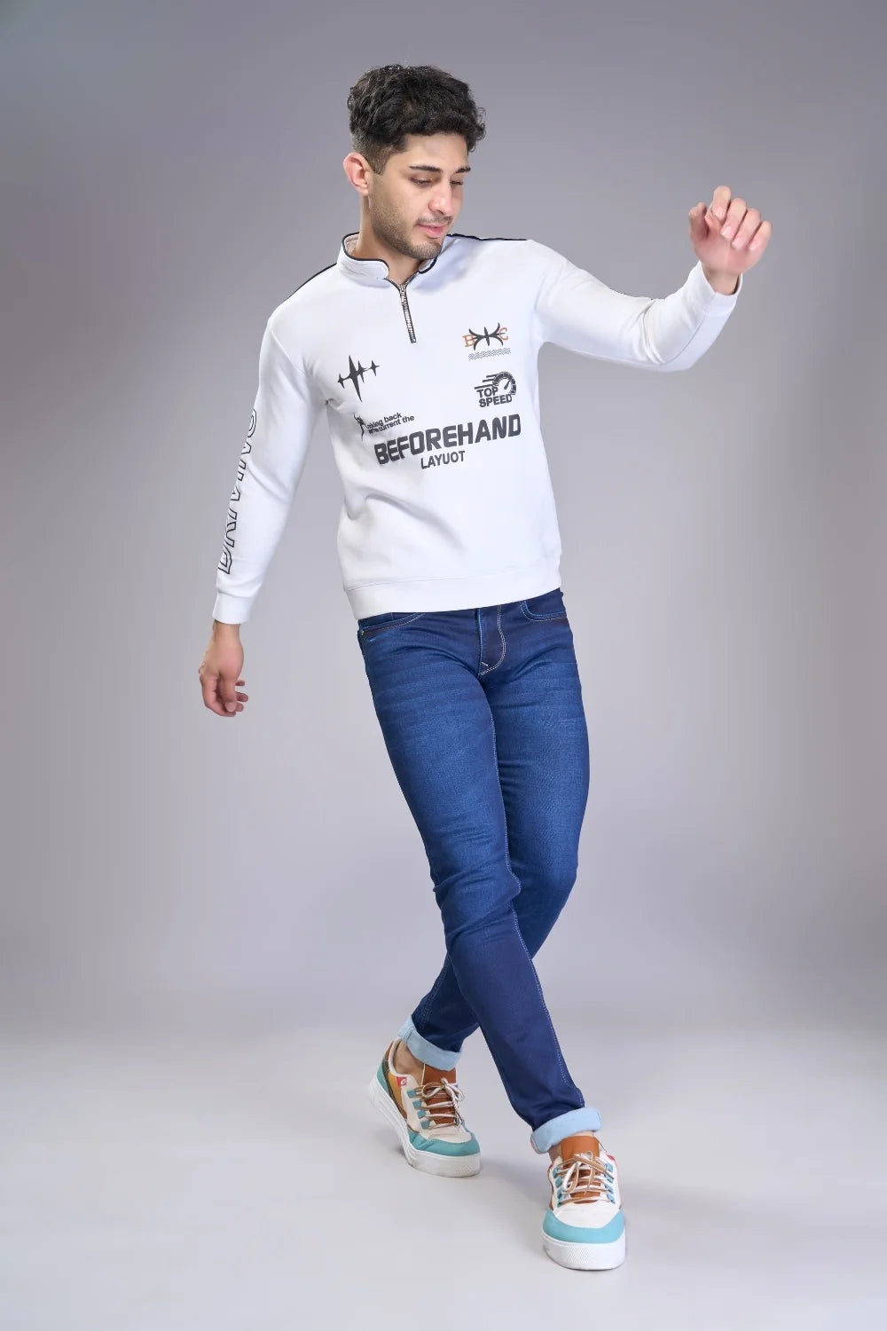 Lifestyle image of men wearing stretchable regular fit jeans