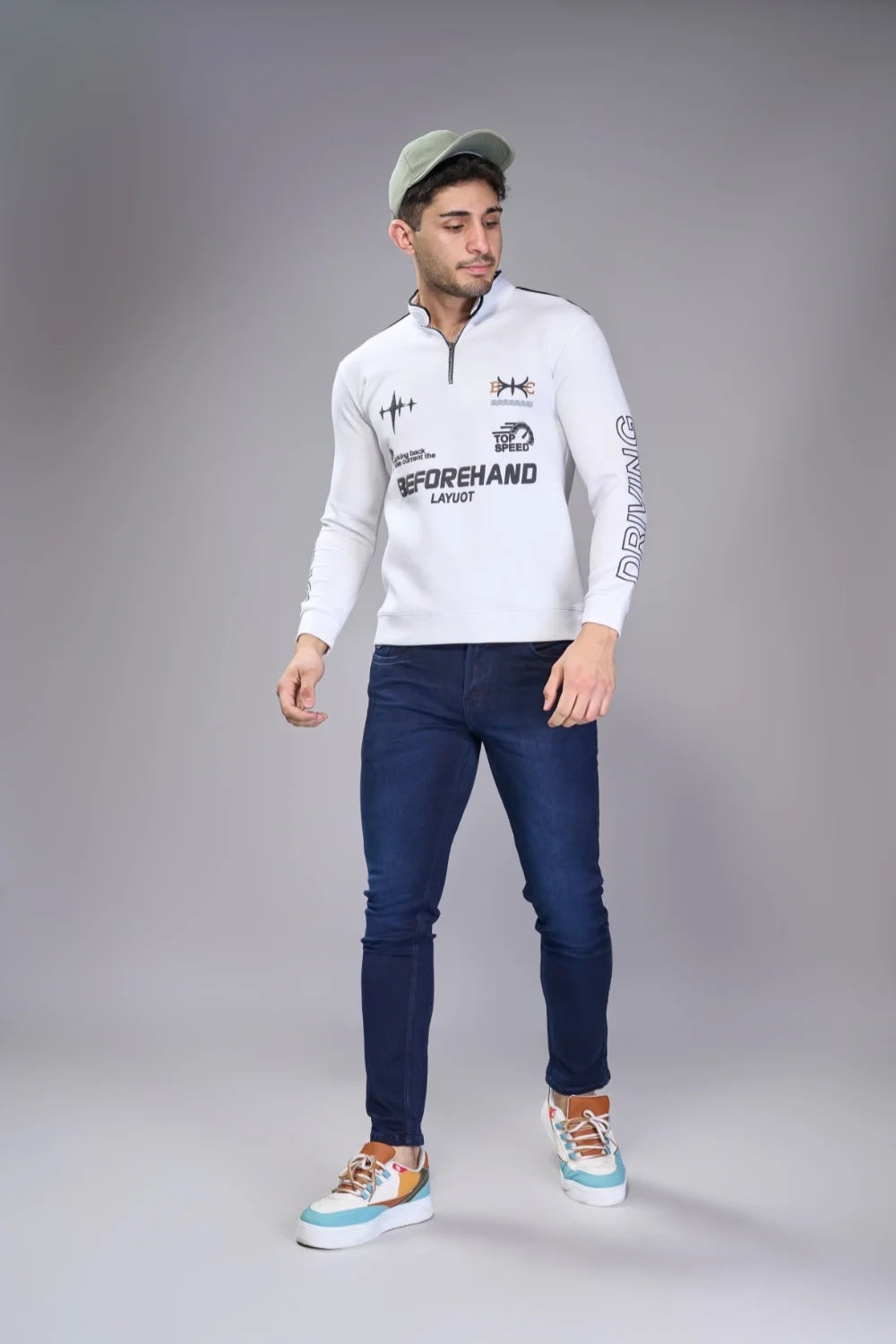 Smart-casual outfit pairing navy tapered denim with suede loafers
